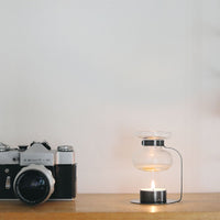 aroma oil warmer in black stainless steel and glass at material26